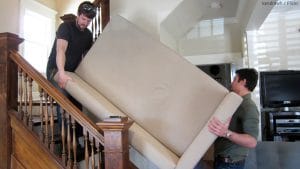 Find out the best way to move heavy furniture up stairs.